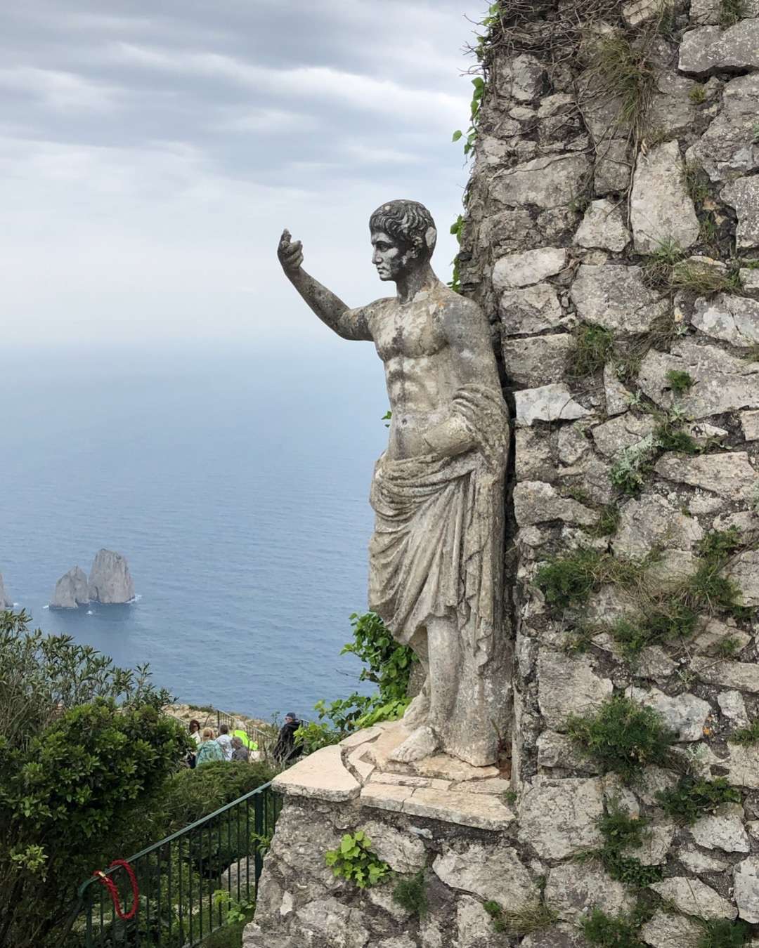 Statue of man overlooking Capri